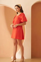 Amagyaa orange mini dress