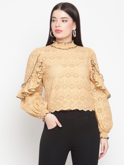 Round neck blouse featuring delicate embroidery for a stylish touch. - Designed with frills that add a feminine and elegant flair. - Smocked cuffs provide a comfortable fit while enhancing the overall design.